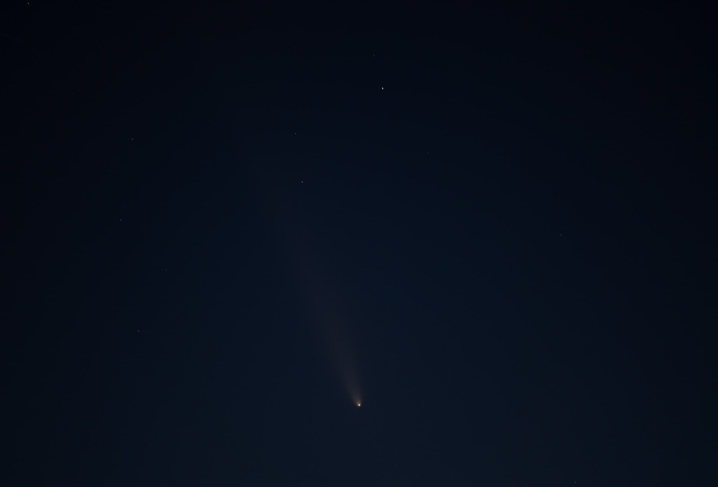 Comet Tsuchinshan-Atlas With Glowing Tail in Night Sky