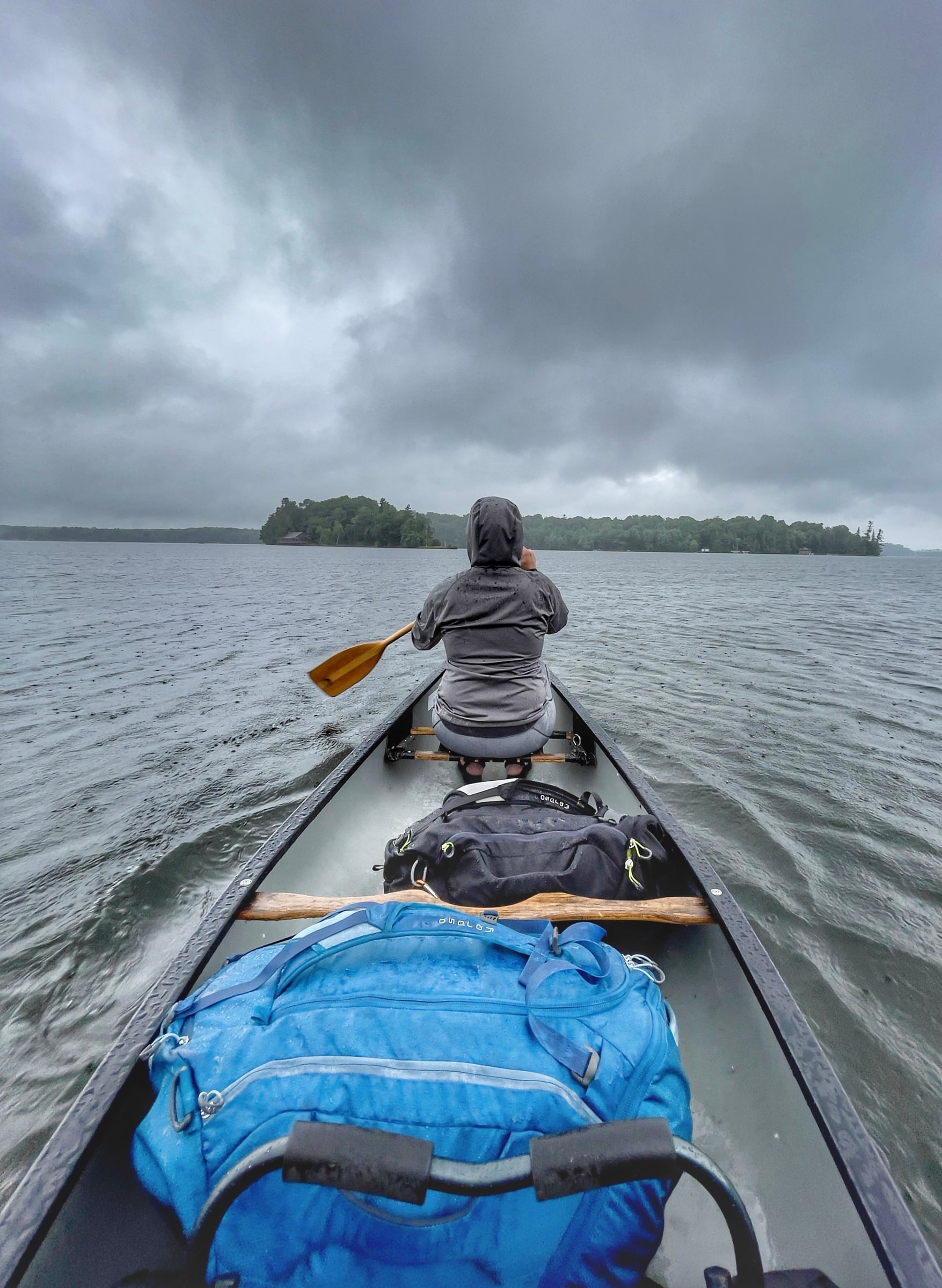Northwoods Kayaking Toward a Distant Island in Wisconsin
