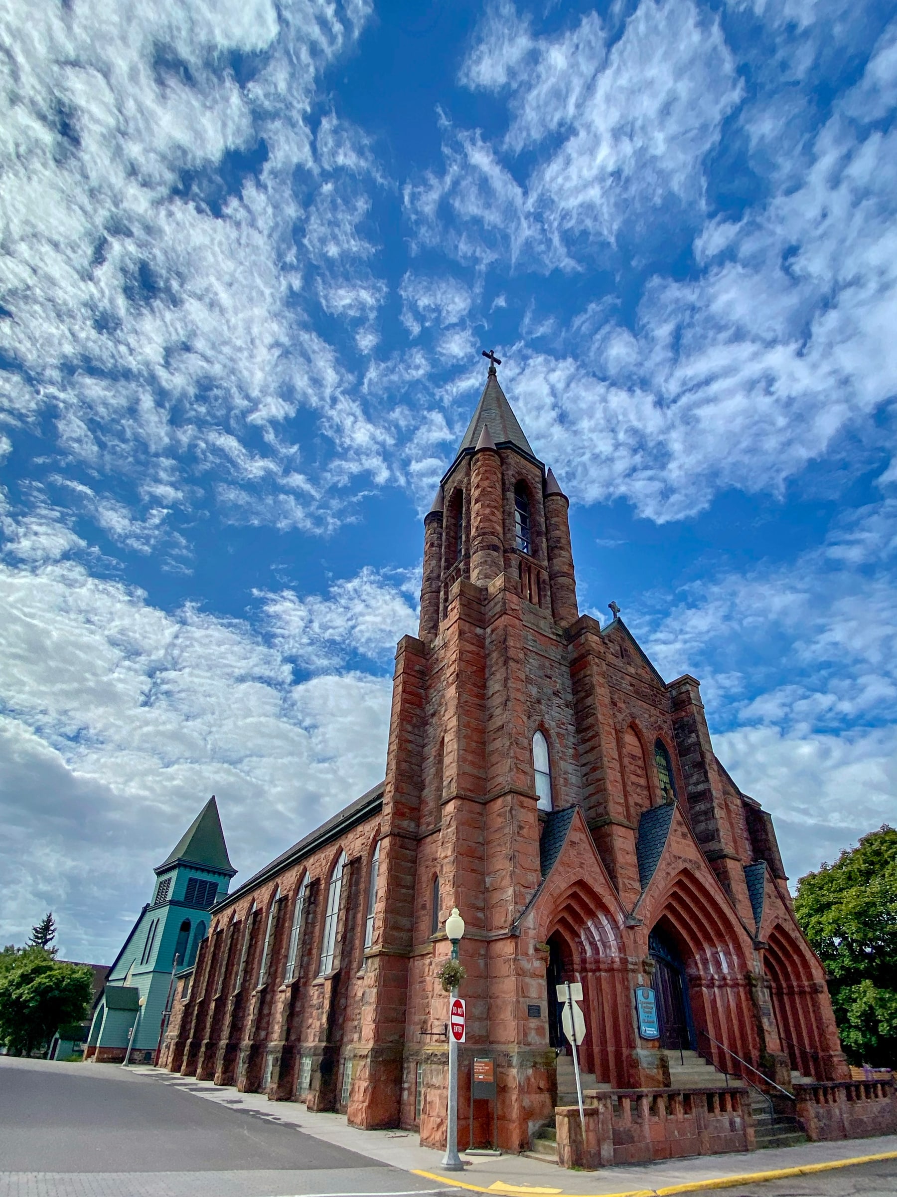 Calumet Historic Brick Church Spire and Clouds