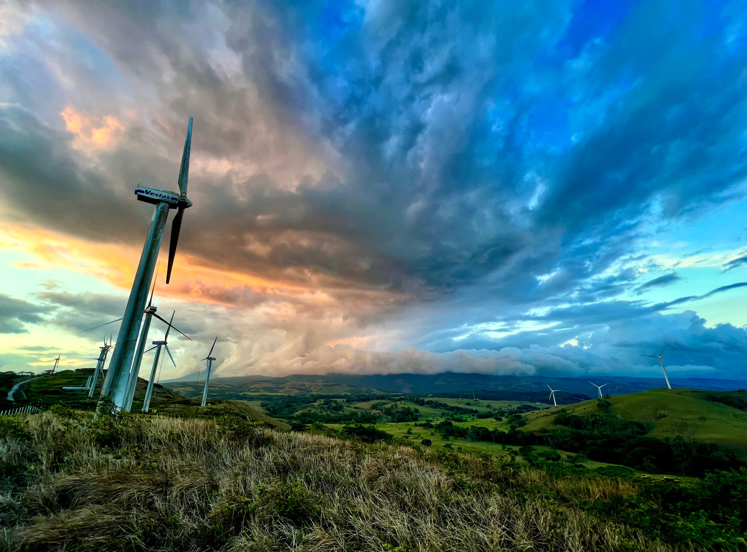 Costa Rica Wind Turbine Under Dramatic Sunset Sky