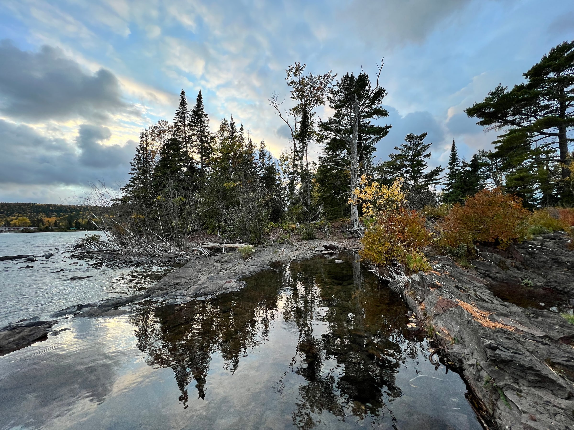 Copper Harbor Rocky Shoreline Reflections With Pines