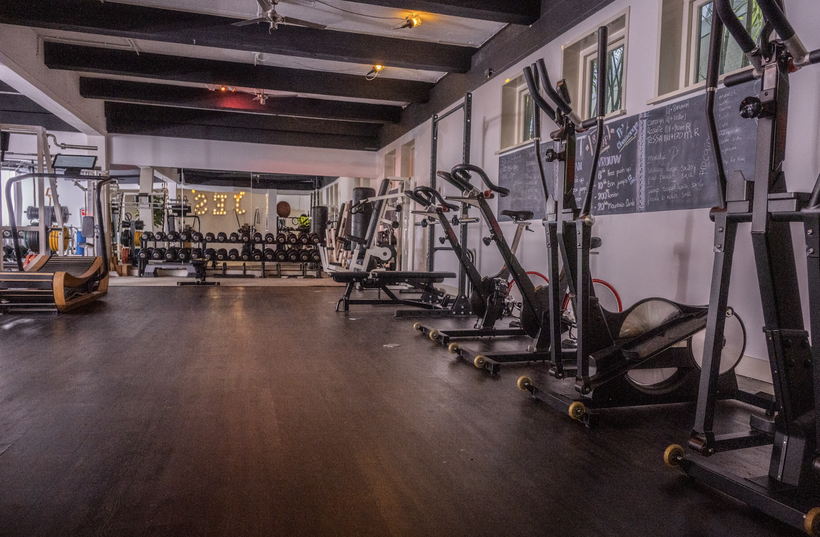 Close-up of dumbbells on a rack at JES Training Hub