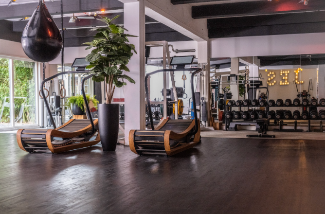 Client doing a workout with a trainer at JES Training Hub