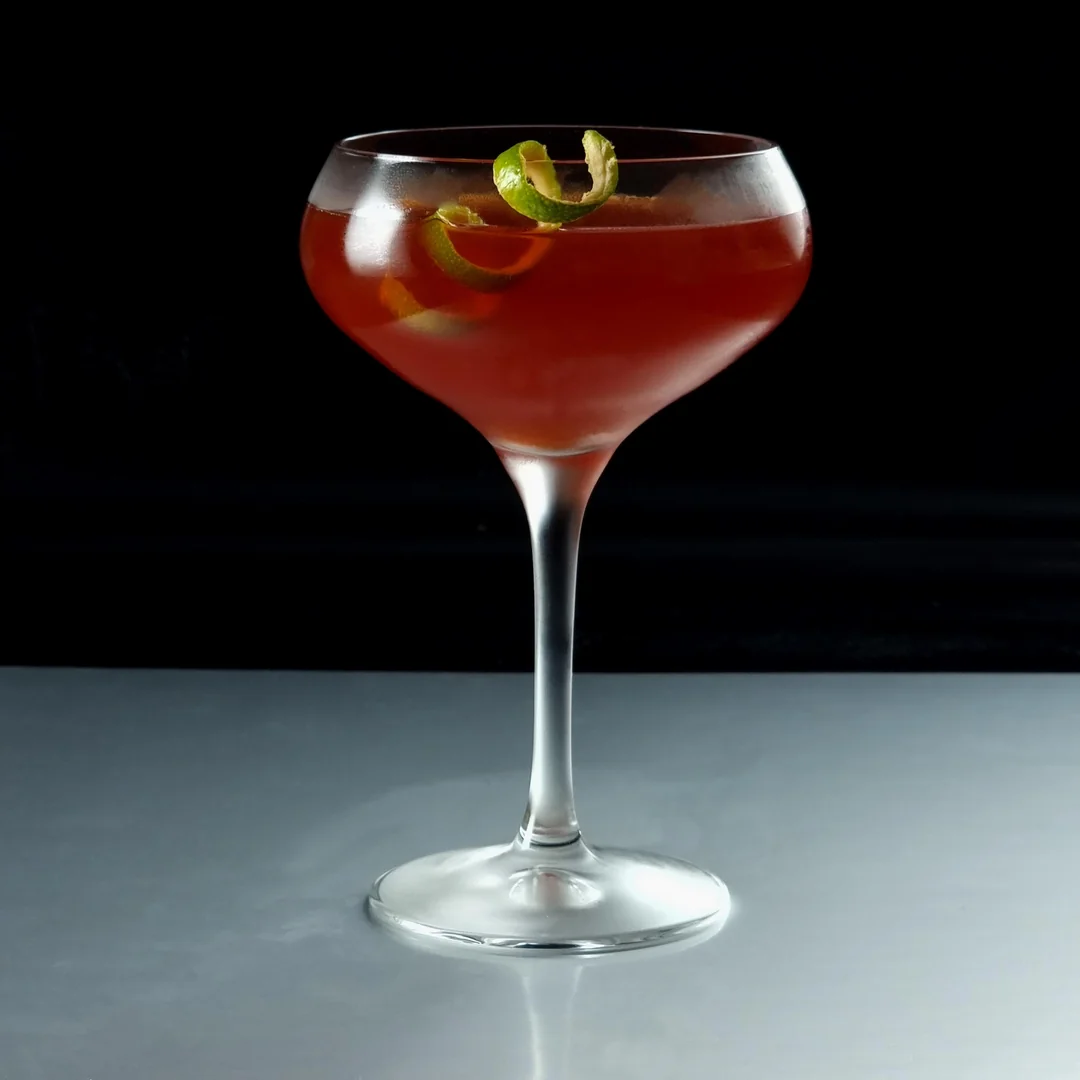 Coupe with an expressed lime zest twist