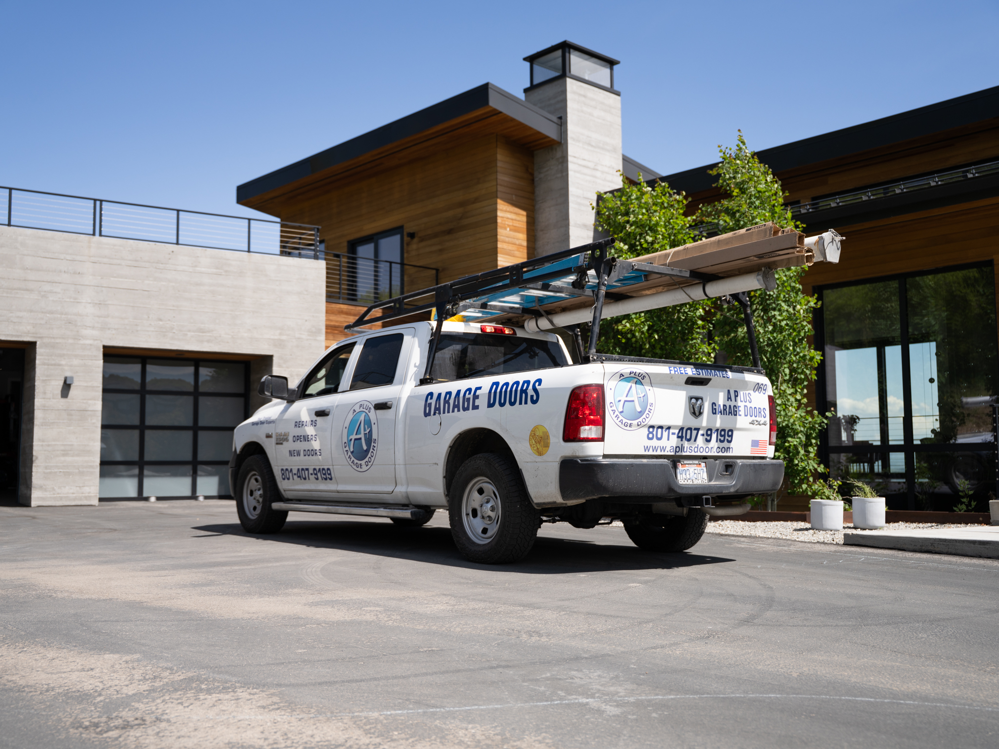 A Plus Garage Door service truck ready for dispatch in West Jordan
