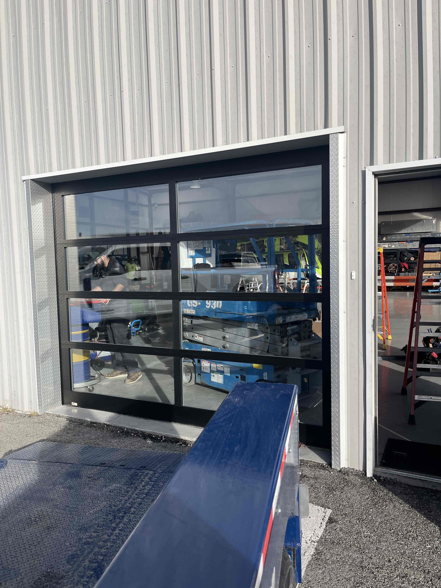 Modern commercial glass garage door installation