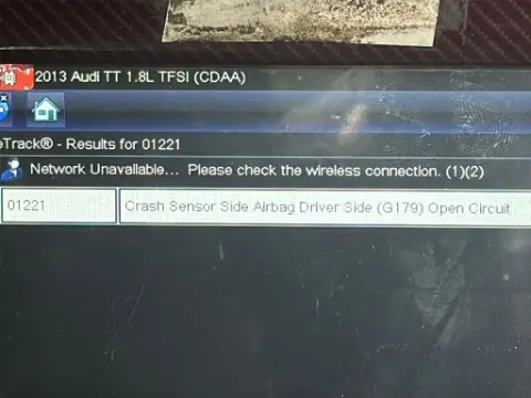 Diagnostic scan tool showing fault code 01221 – Crash Sensor Side Airbag, Driver Side (G179) on Audi TT dashboard