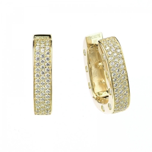 Par Aros linea Premium, argollas, ovaladas, pavee en el frente y piedras separadas en los costados , amarillas. Largo aprox: 19 mm