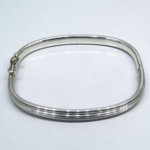 pulsera esclava avellana, rayada externamente, cierre cajon