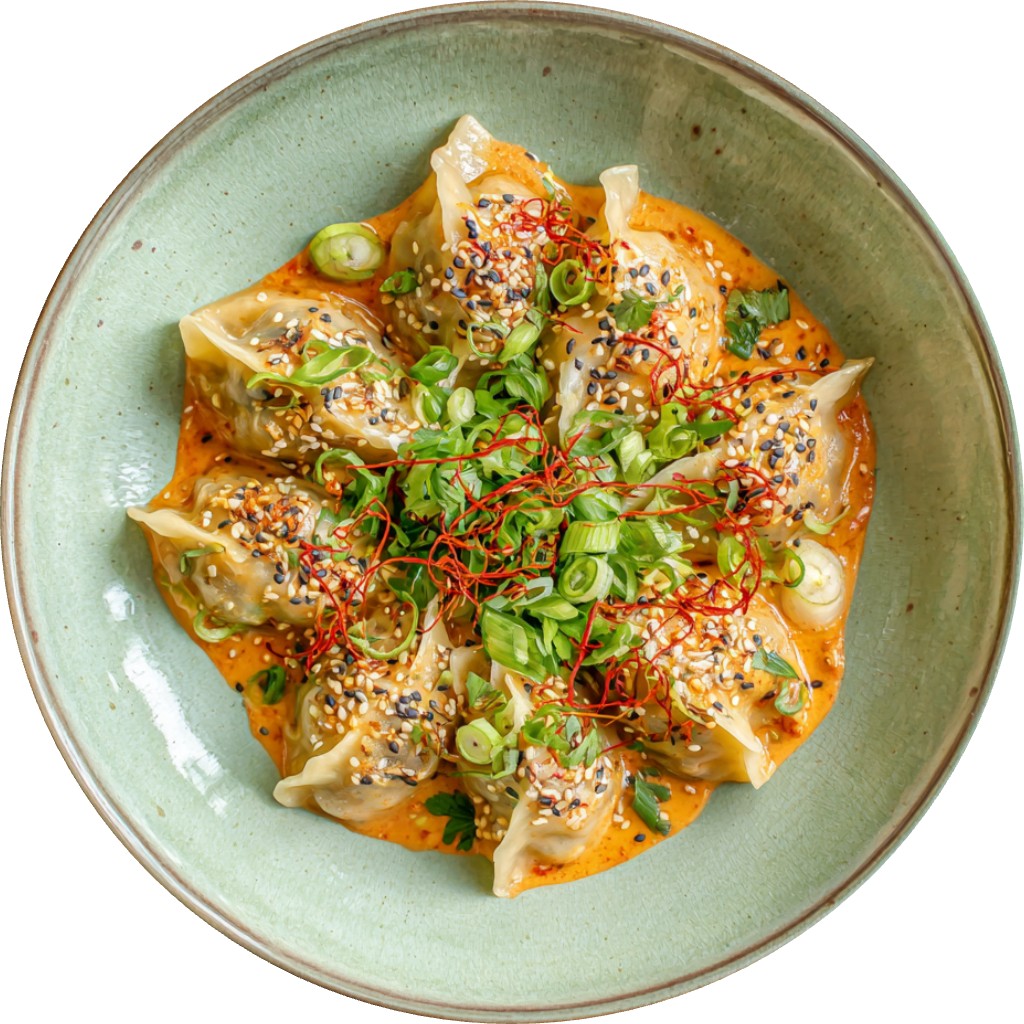 Comforting & Quick Baked Dumplings With Spicy Coconut Sauce