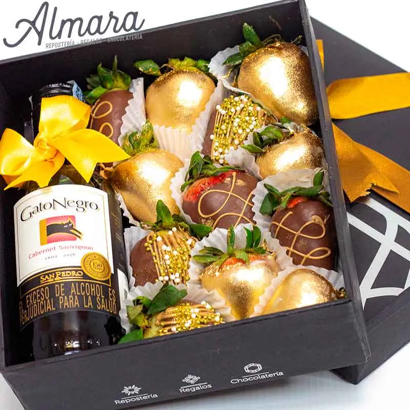 Caja de fresas y piba de vino