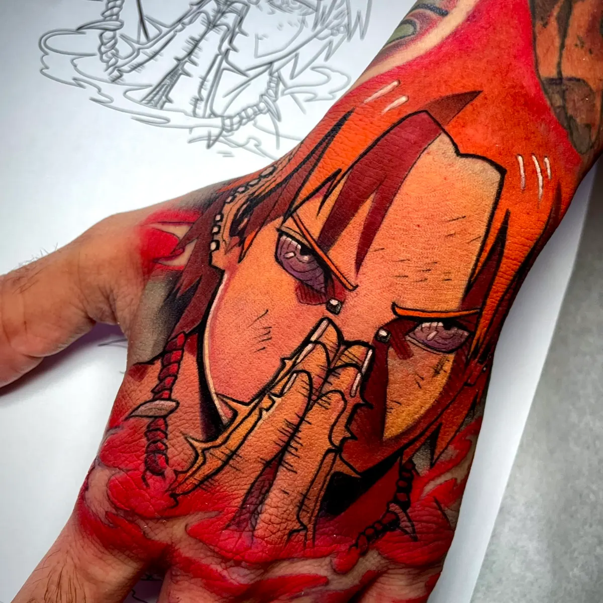 tatuaje Ace, tatuaje Portgas D Ace, tatuaje One Piece, tattoo anime a color, tatuaje manga, tatuaje en mano, tattoo otaku, tatuaje de fuego.