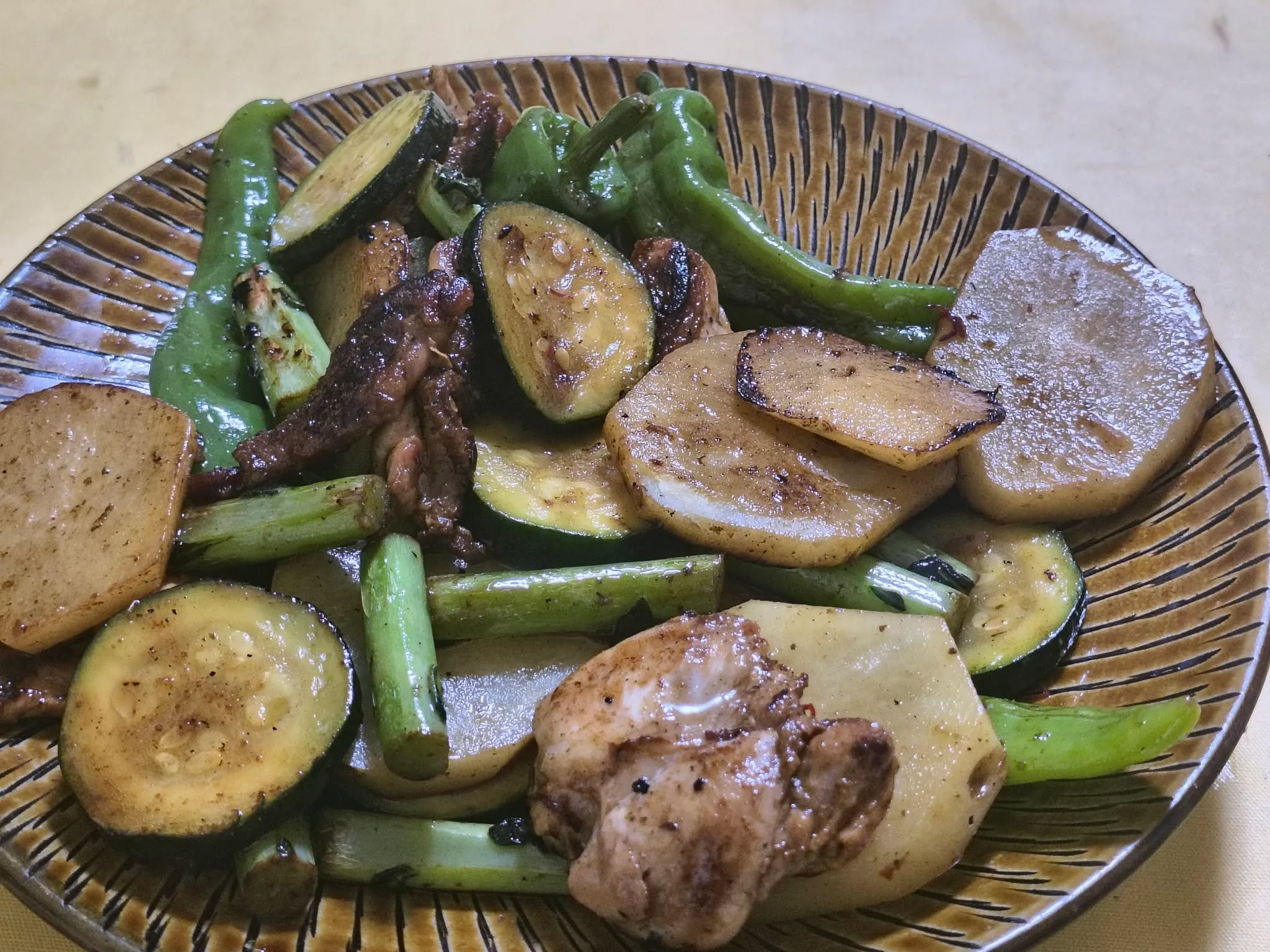 Chicken shoulder tenders sautéed with leftover vegetables in white wine. Making good use of stems and root vegetables.