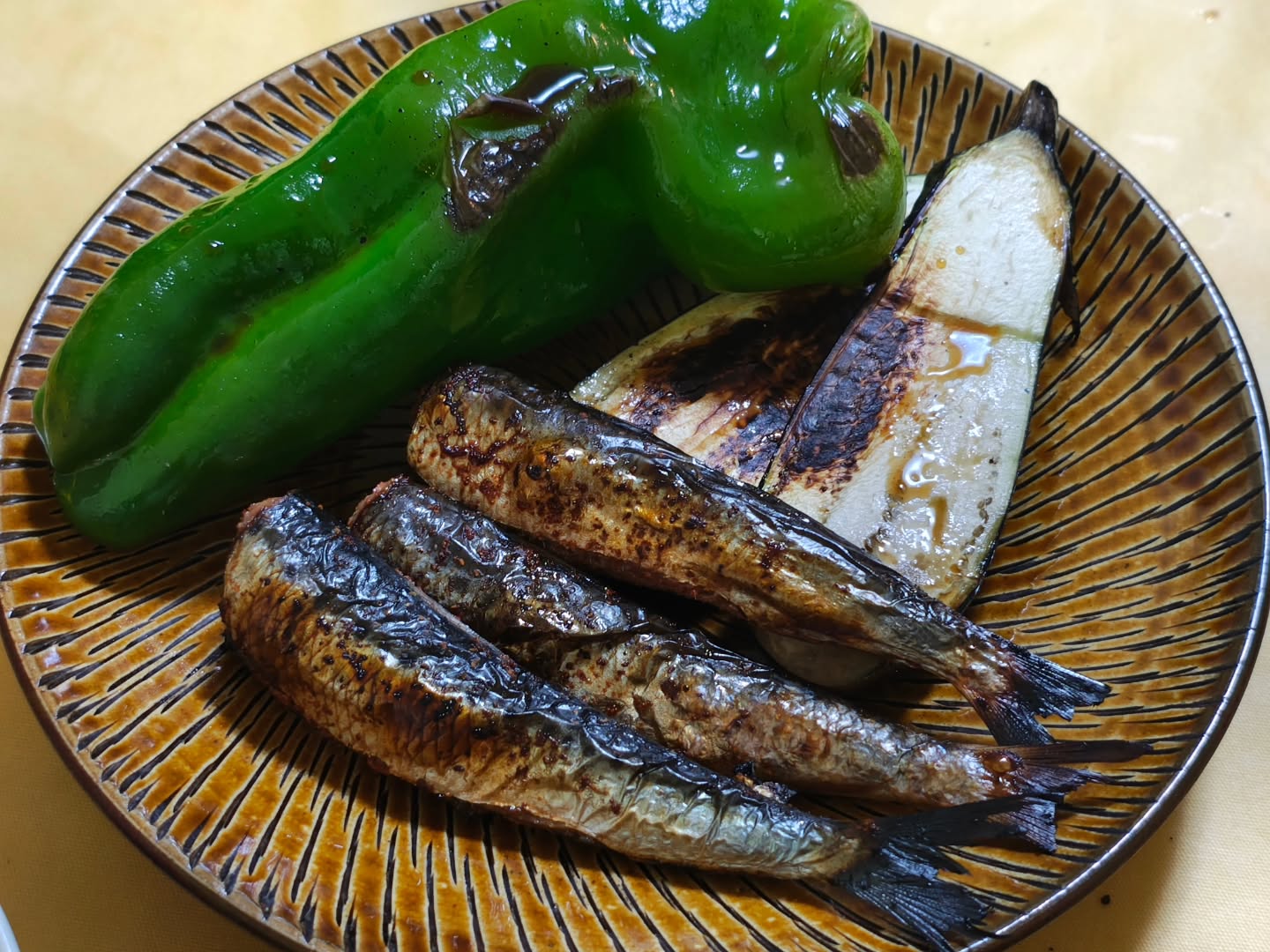 Evening tray with giant bell peppers, mentaiko sardines, and grilled eggplant