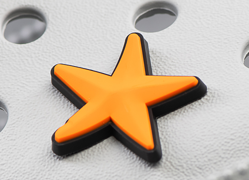 Crocs charm - virus - Orange starfish