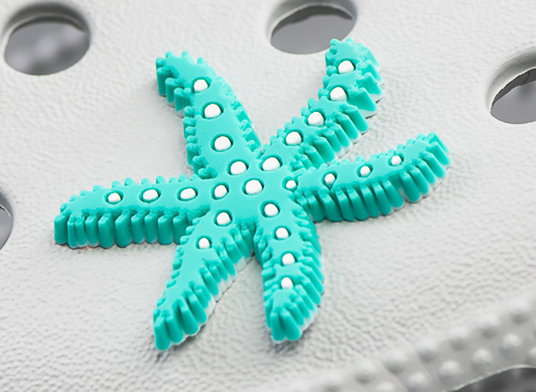 Crocs charm - virus - Turquoise starfish