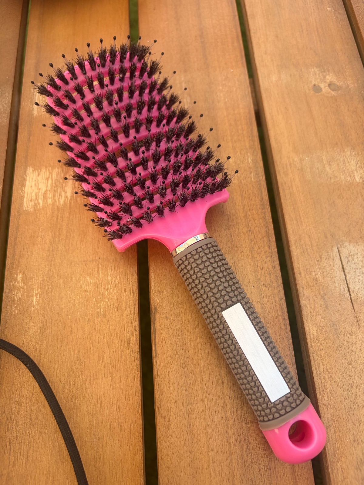 Brosse à cheveux rose démêlante