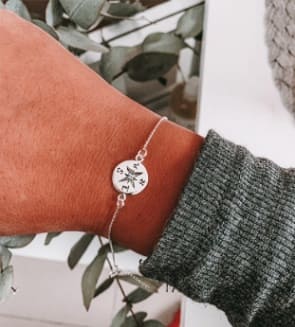 Pulsera de plata con brújula unida
