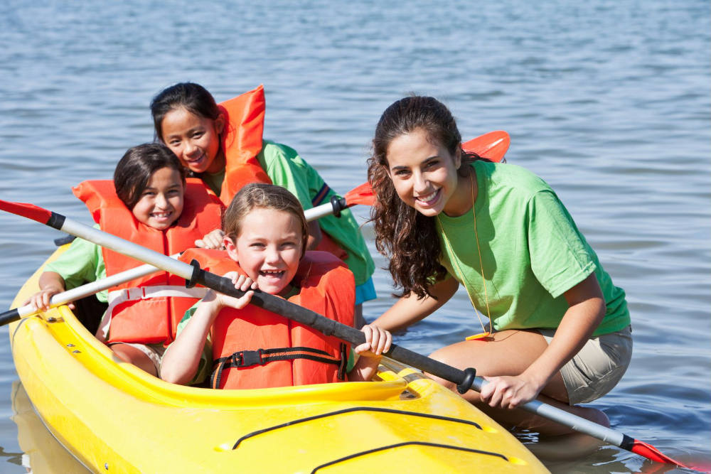 Campers in a Kayak with counselors