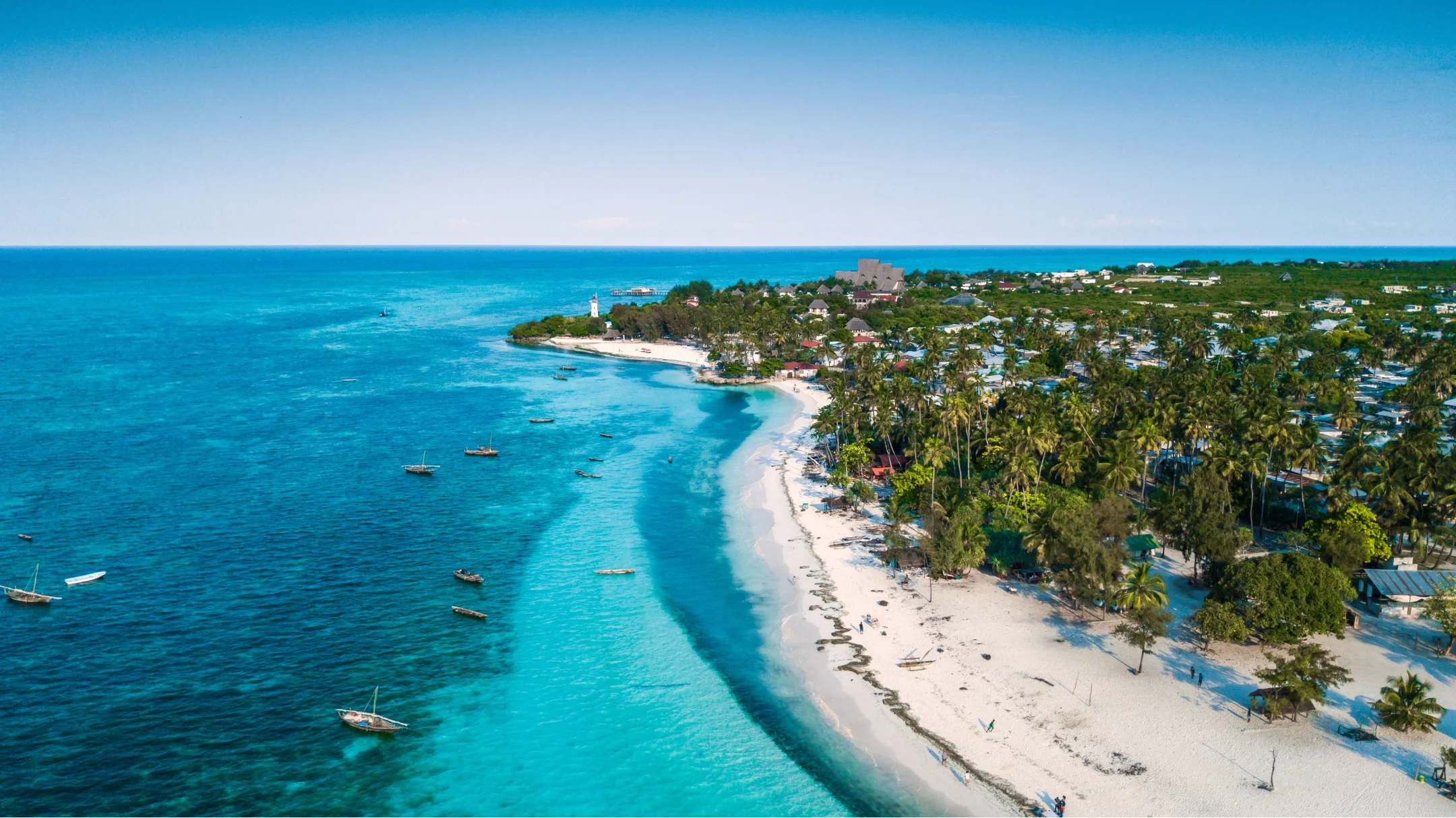 Turquoise coastal village aerial