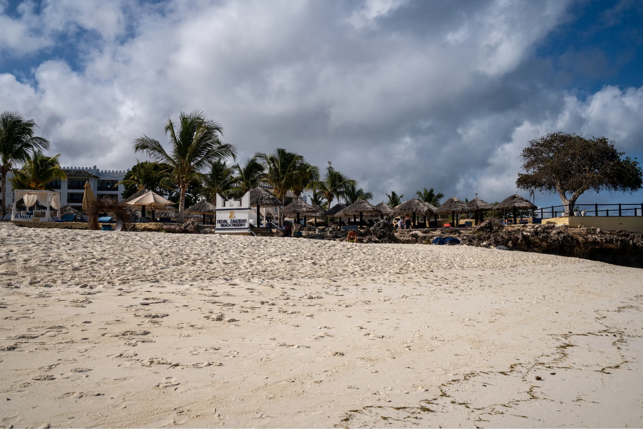 Beachfront resort with palm huts in Zanzibar