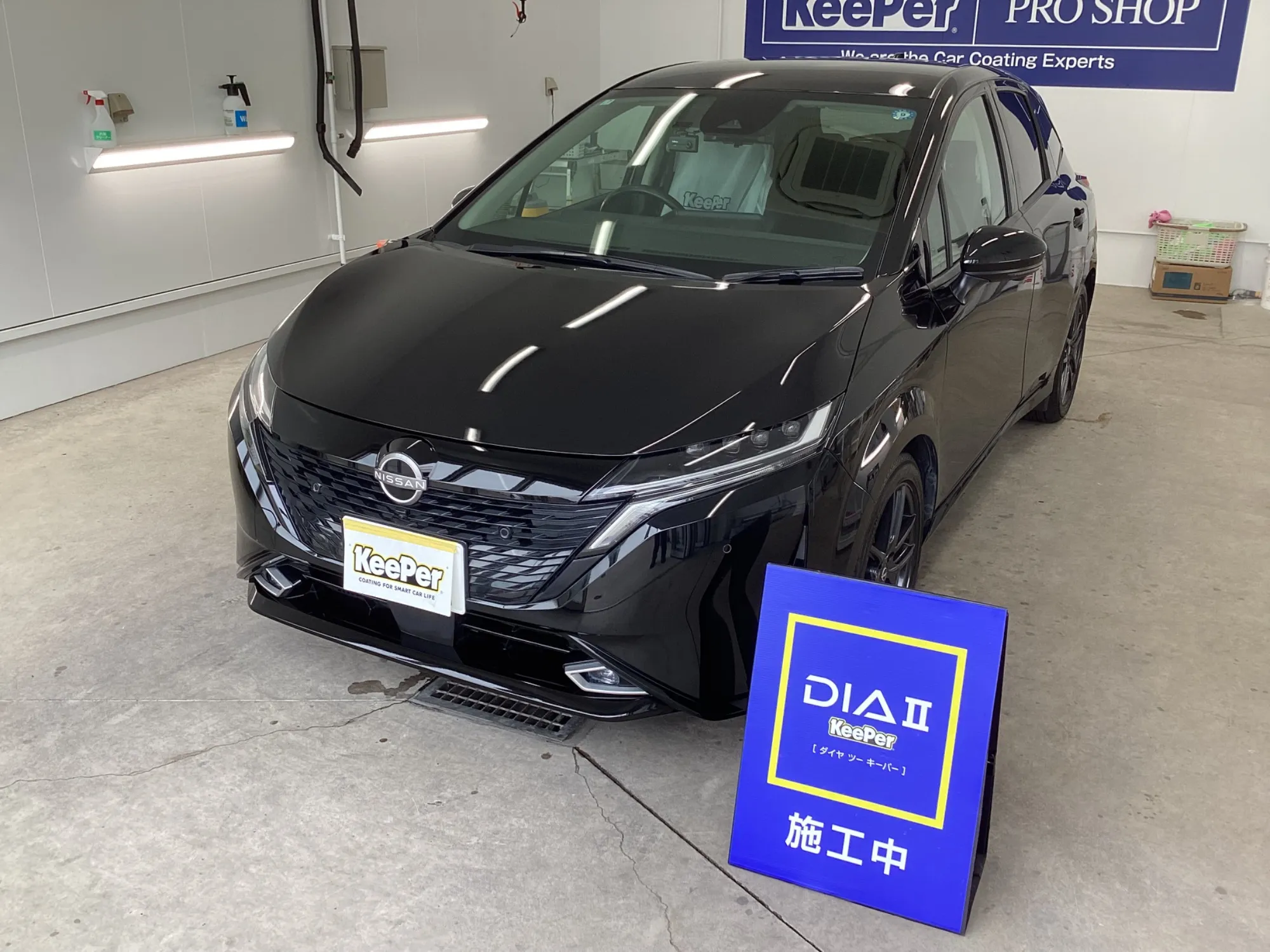 日産オーラ e-POWERにダイヤモンドキーパーを施工したブラックのコンパクトカー
