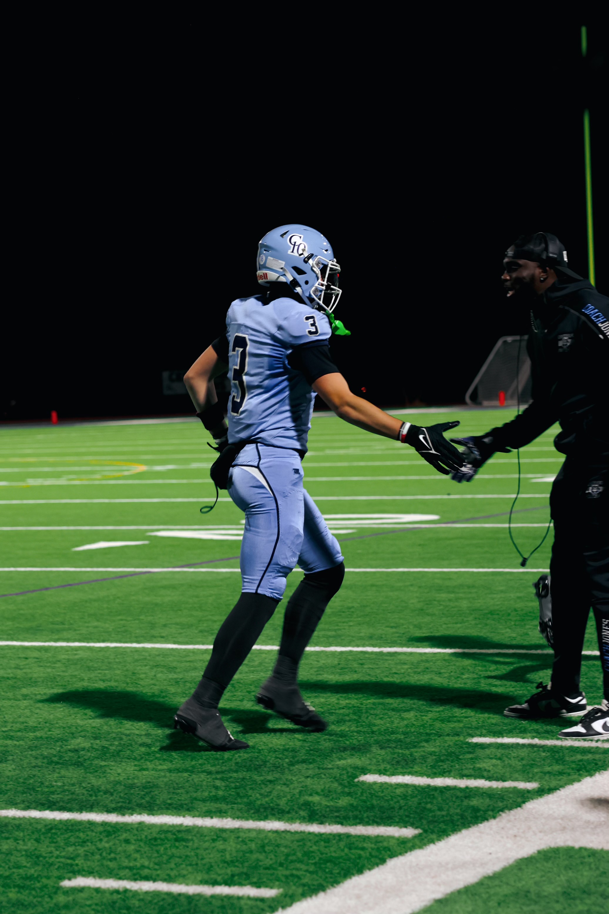 Coach Coach Primary Action Photo