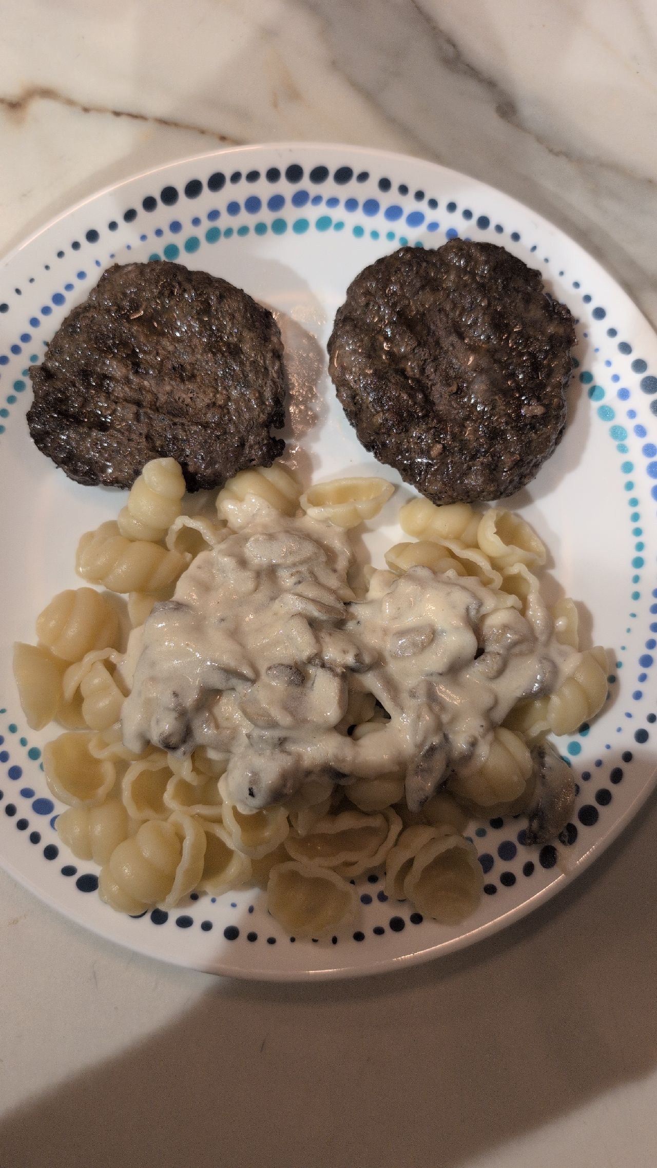 Grilled Beef Patties with Creamy Mushroom Shell Pasta