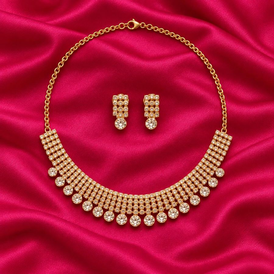 Gold Tone Jeweller set with colar necklace & matching earrings