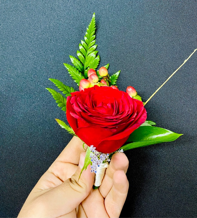 Boutonnière con rosa