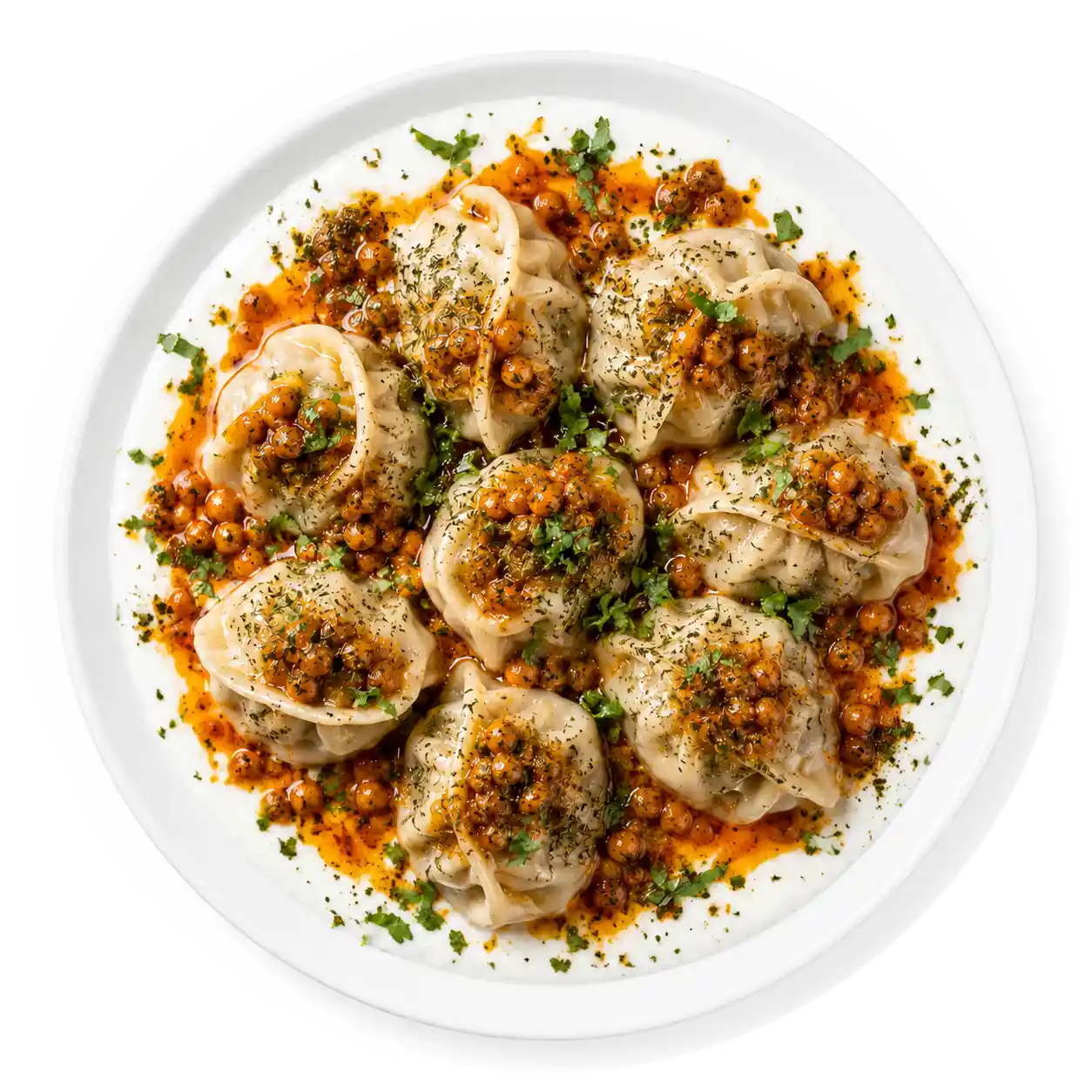 Mantu Afghan dumplings with yogurt, lentils, and dried mint