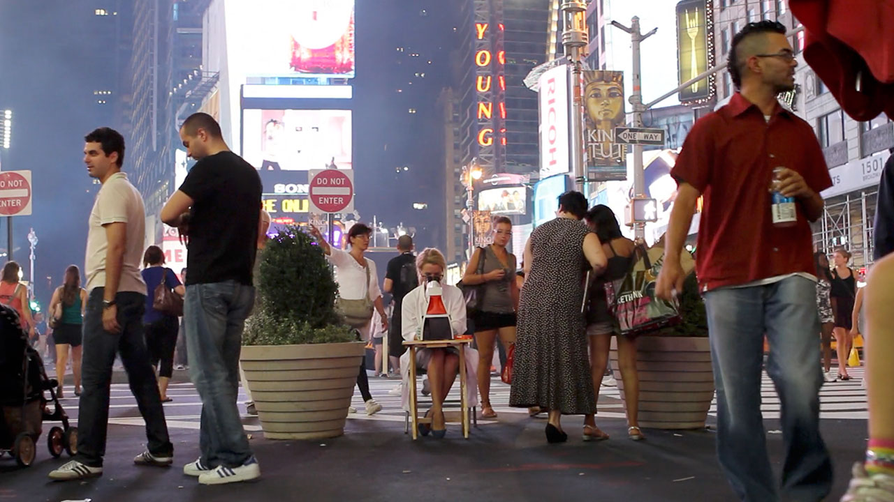 Peering Through A Microscope in Times Square