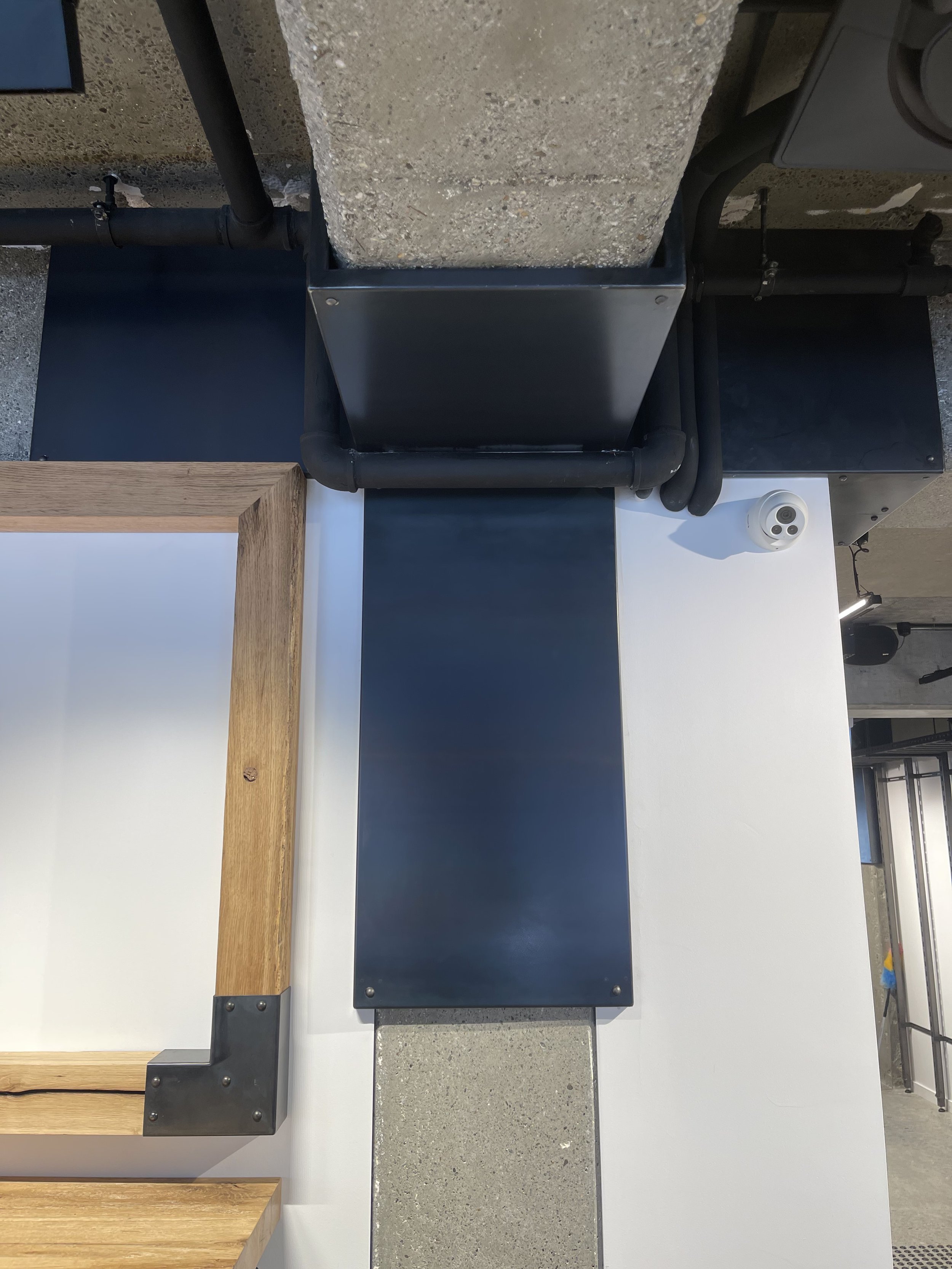 Installed hot-rolled steel beam wrap