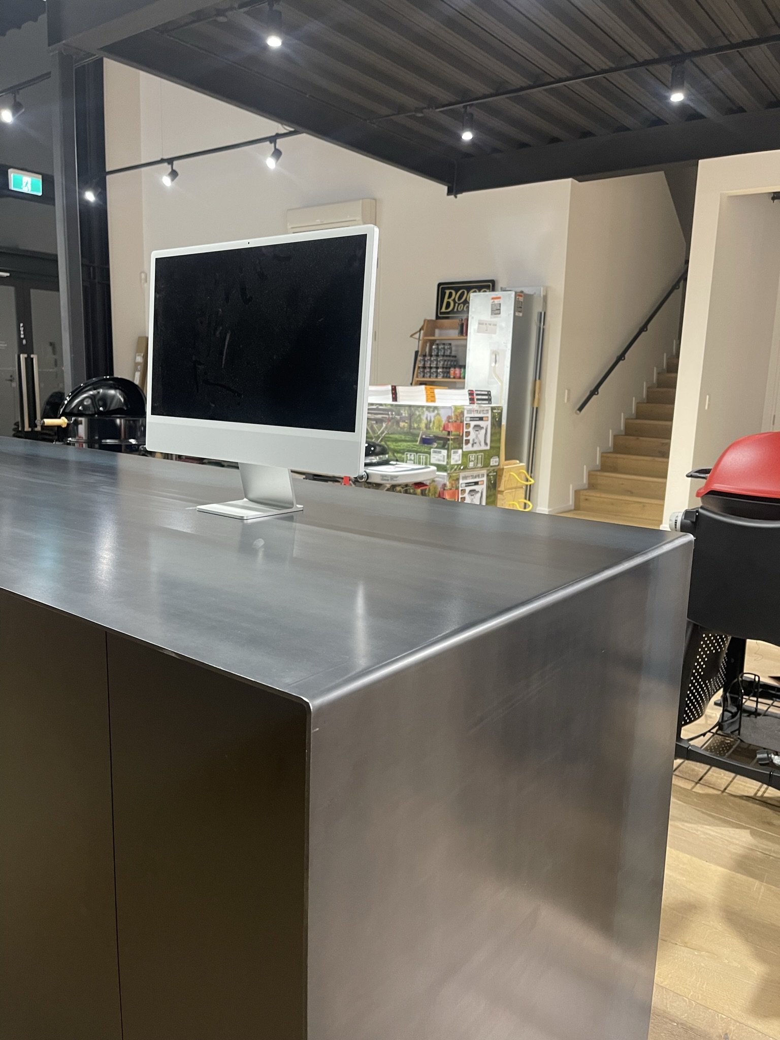 Hot-rolled steel waterfall counter sealed with beeswax