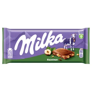 Šokoladas iš alpių pieno su smulkintais lazdynų riešutais MILKA, 100 g