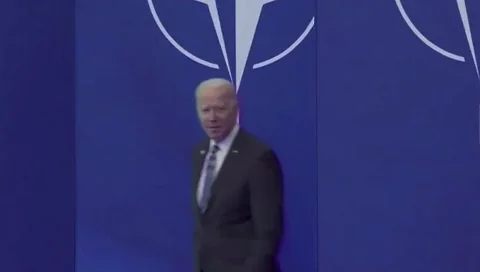 Joe Biden appearing at a NATO meeting.