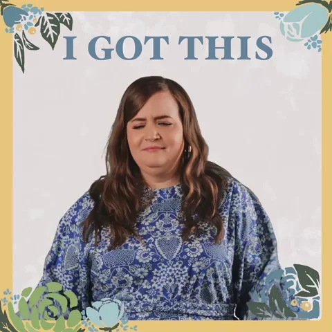 Aidy Bryant saying, 'I got this!' A queen's crown appears on her head as she swipes her hands across her shoulders.