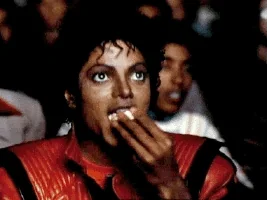 Michael Jackson eating popcorn.