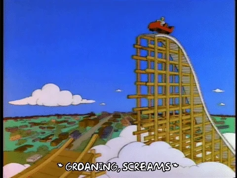 Homer Simpson riding a roller coaster to nowhere.