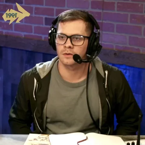 A podcast host wearing a headset and saying, 'Which one is the right one?'
