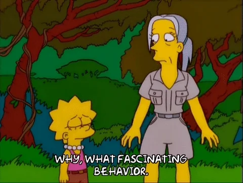 Lisa Simpson meets Jane Goodall in a forest. Jane says, 