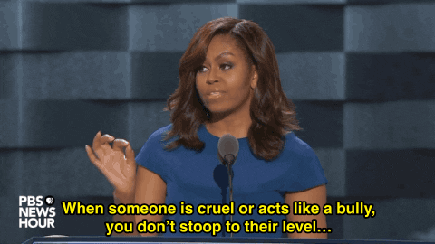Gif of Michele Obama giving a motivational speech and using hand gestures to make her point.