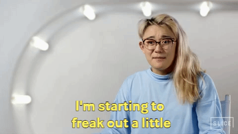 A woman with glasses saying, 
