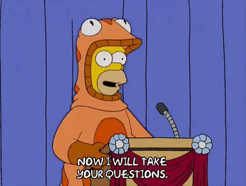 Homer Simpson at a podium saying, 