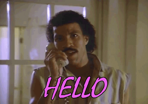 Lionel Richie saying hello into telephone