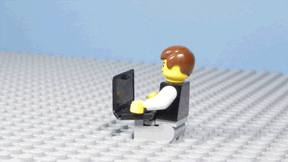 Lego figure gets frustrated and throws computer