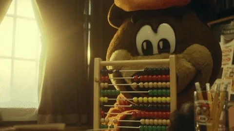 A bear using an abacus to count.