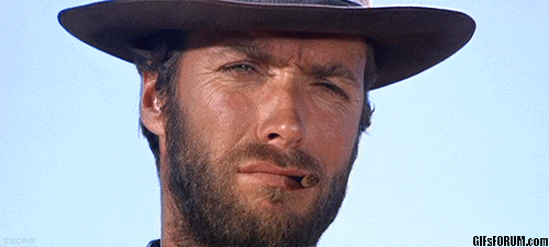 Clint Eastwood with cigarette in mouth, nodding calmly
