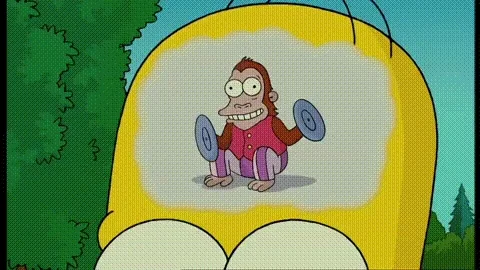 A monkey clapping cymbals inside Homer Simpson's head, symbolizing a noisy, racing mind.