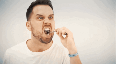 Animated image of man brushing teeth.